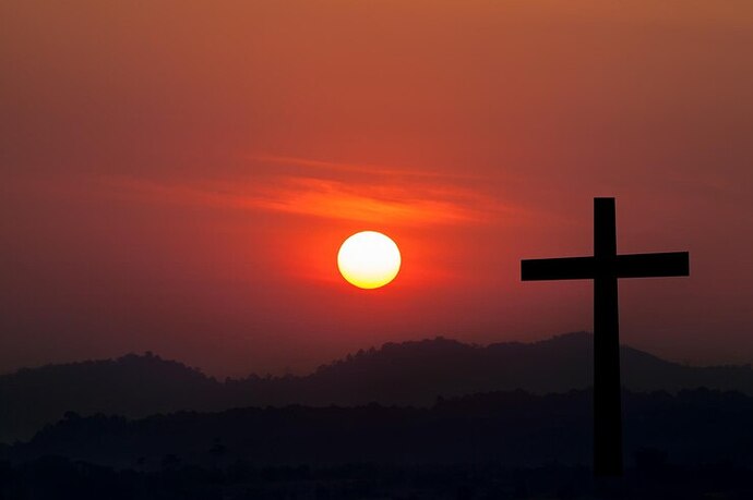 silueta-cruz-encima-ocaso-plano-fondo_33900-3855